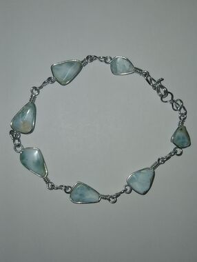 Silver Bracelet Featuring Light Blue Stones